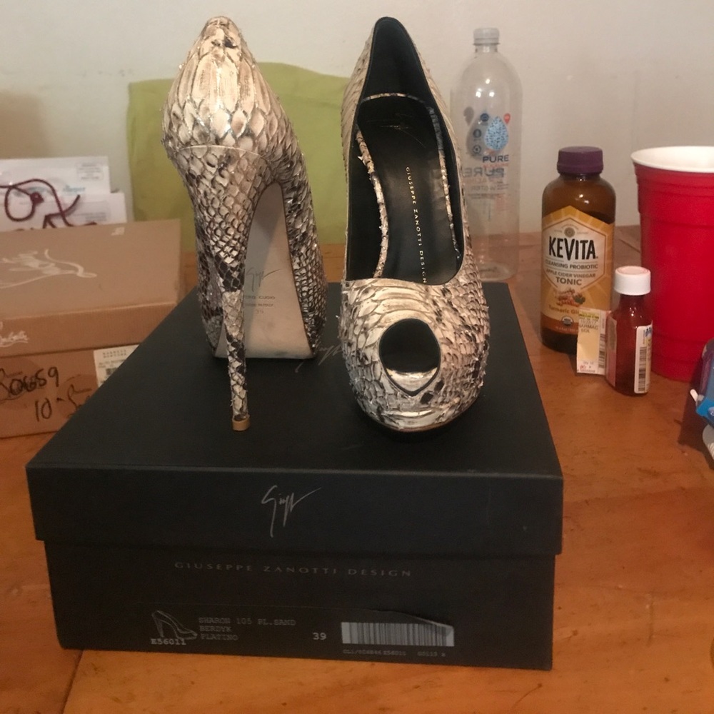 Giuseppe worn once with original box and bags