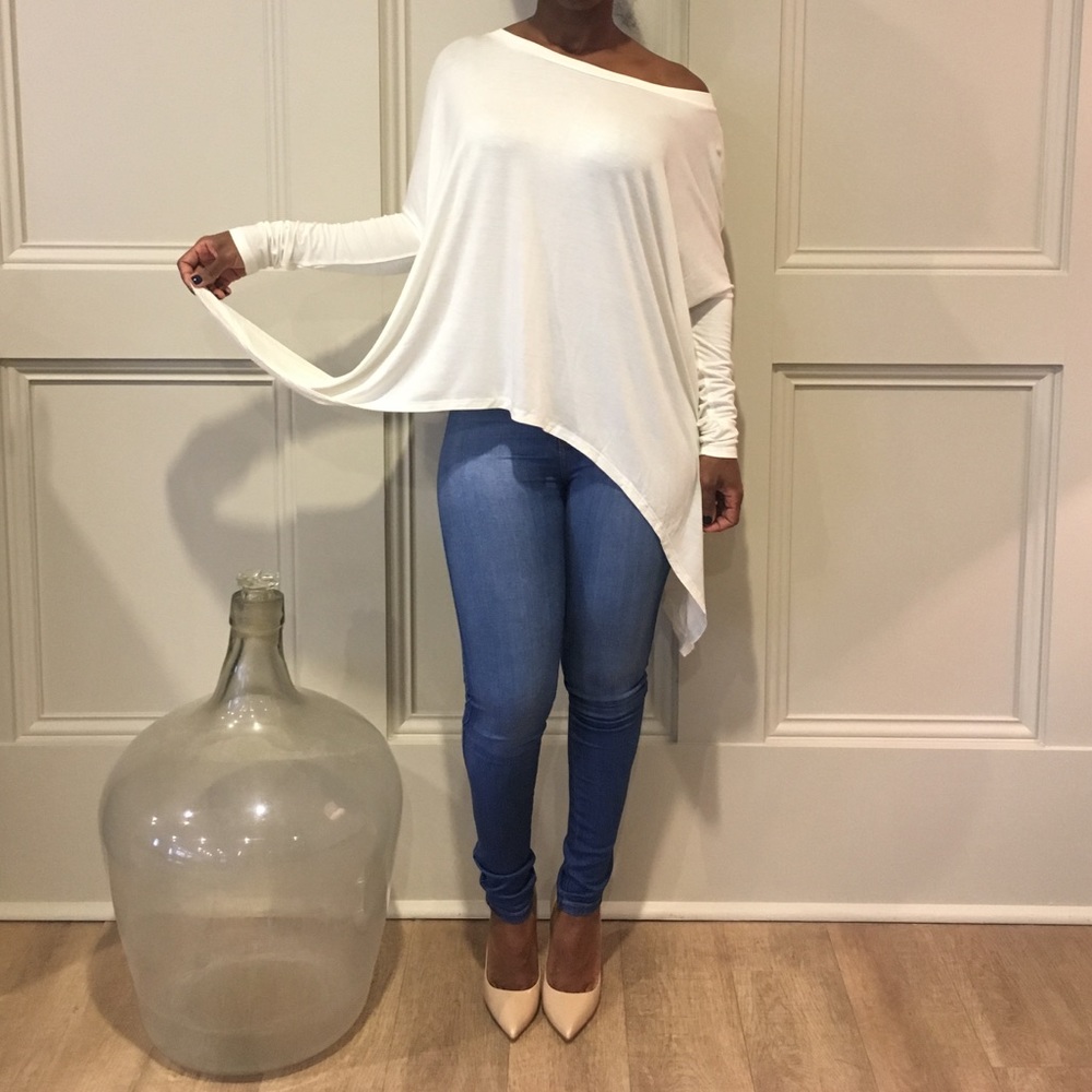 Off the shoulder cream over sized shirt.