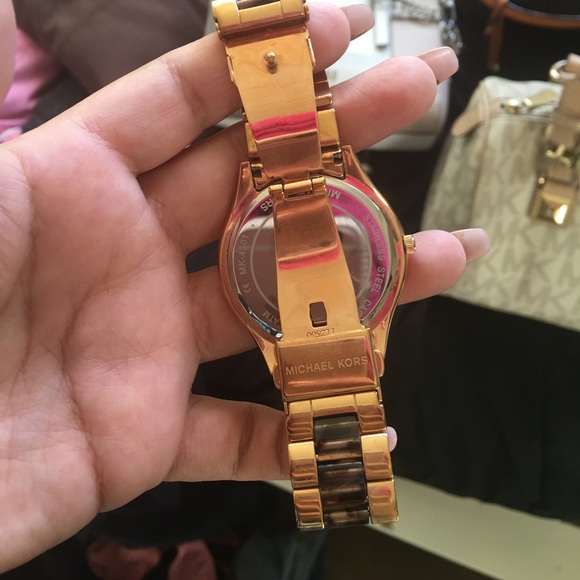 Michael Kors handbags and Watch.
