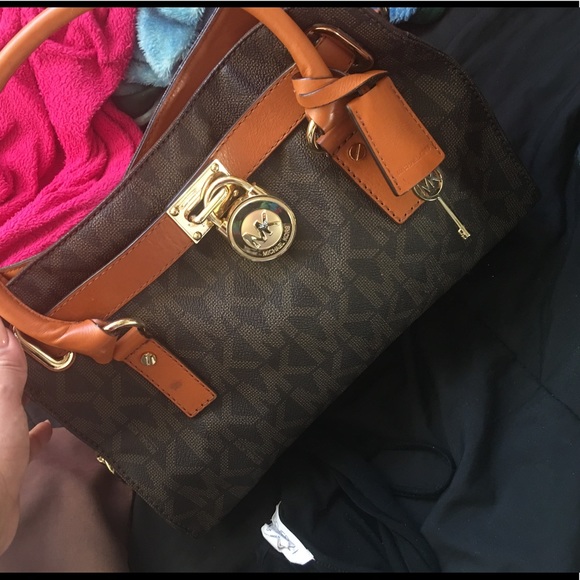 Michael Kors handbags and Watch.
