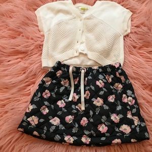 Sweater and quilted floral skirt