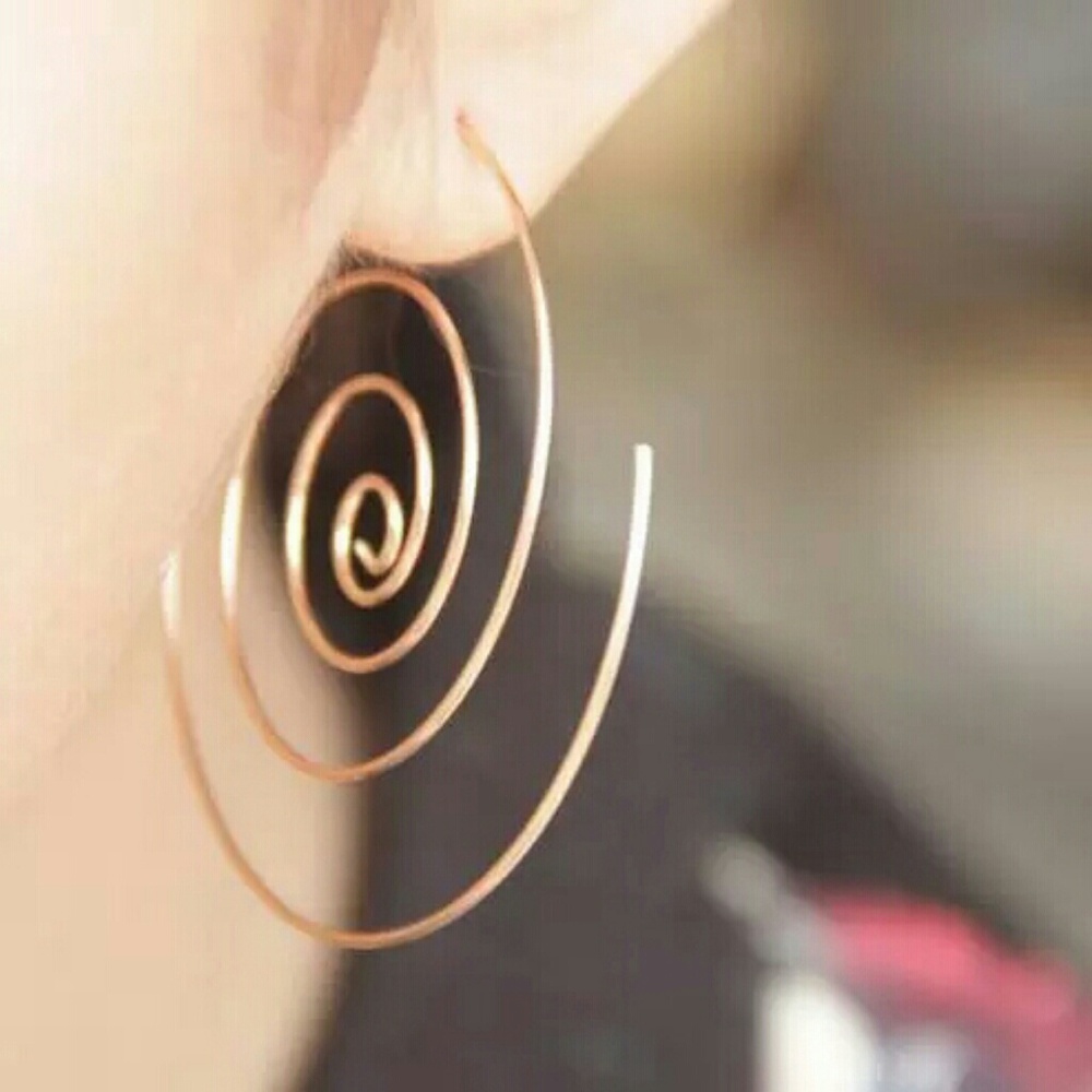 Gold spiral statement earrings........