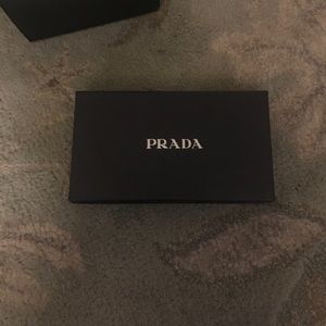 Prada box. Fits larger wallet
