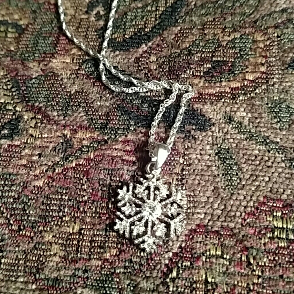 Silver tone snowflake necklace