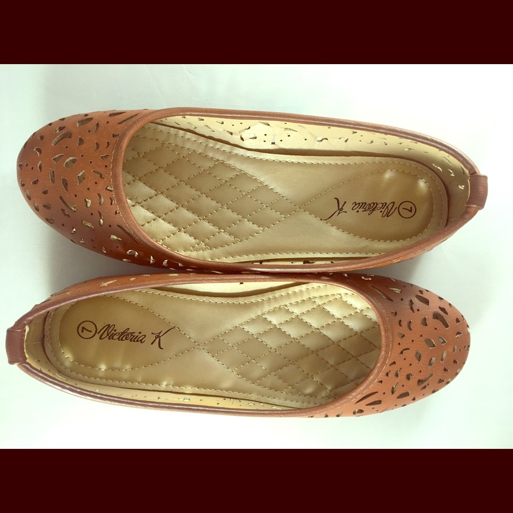 Brown leather flats