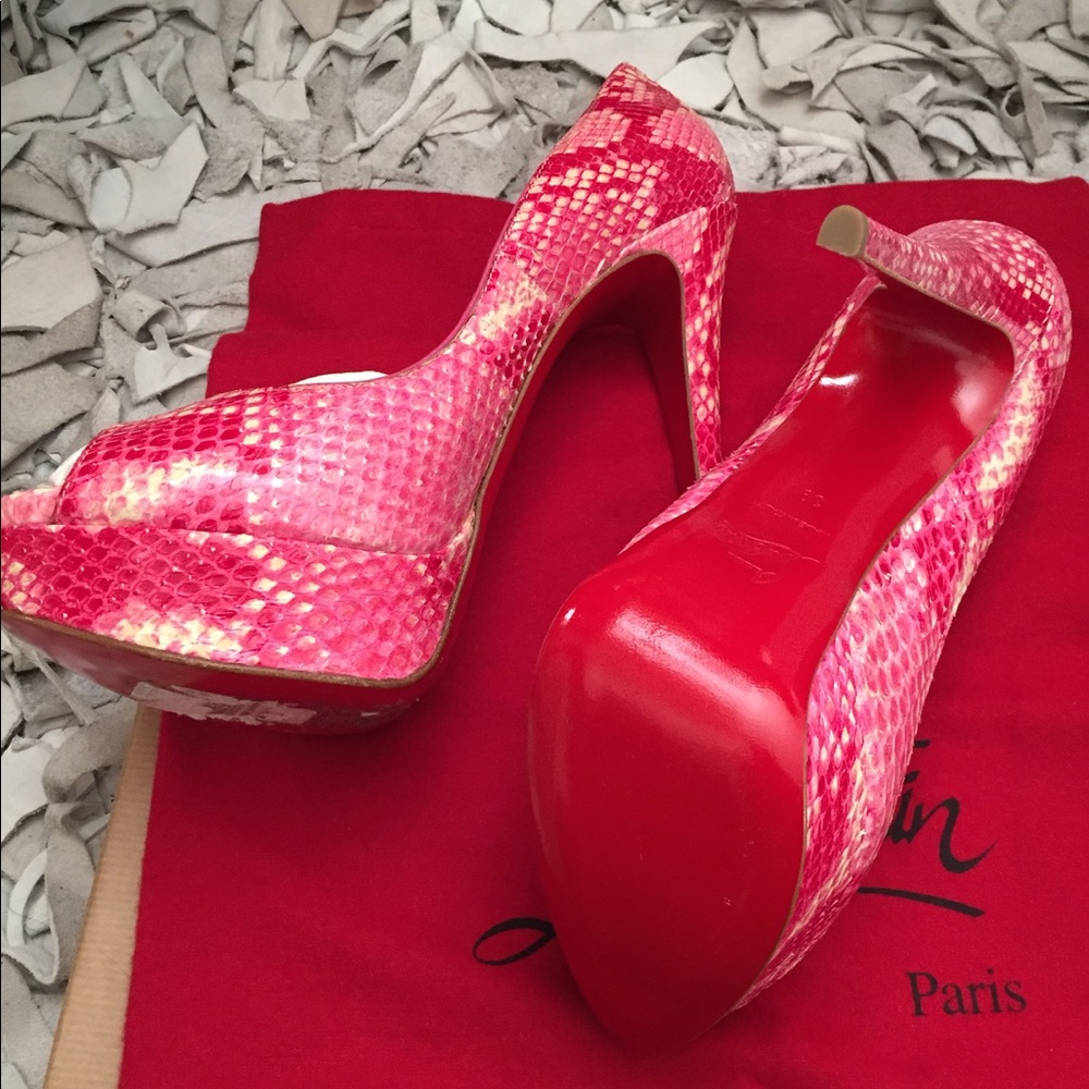 Authentic Christian Louboutin (never worn)