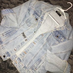 Jean jacket embellished with patches
