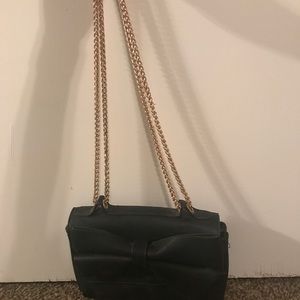 Charming Charlie black cross body bow purse