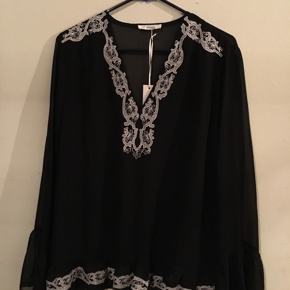 Sheer top with long sleeves and lace
