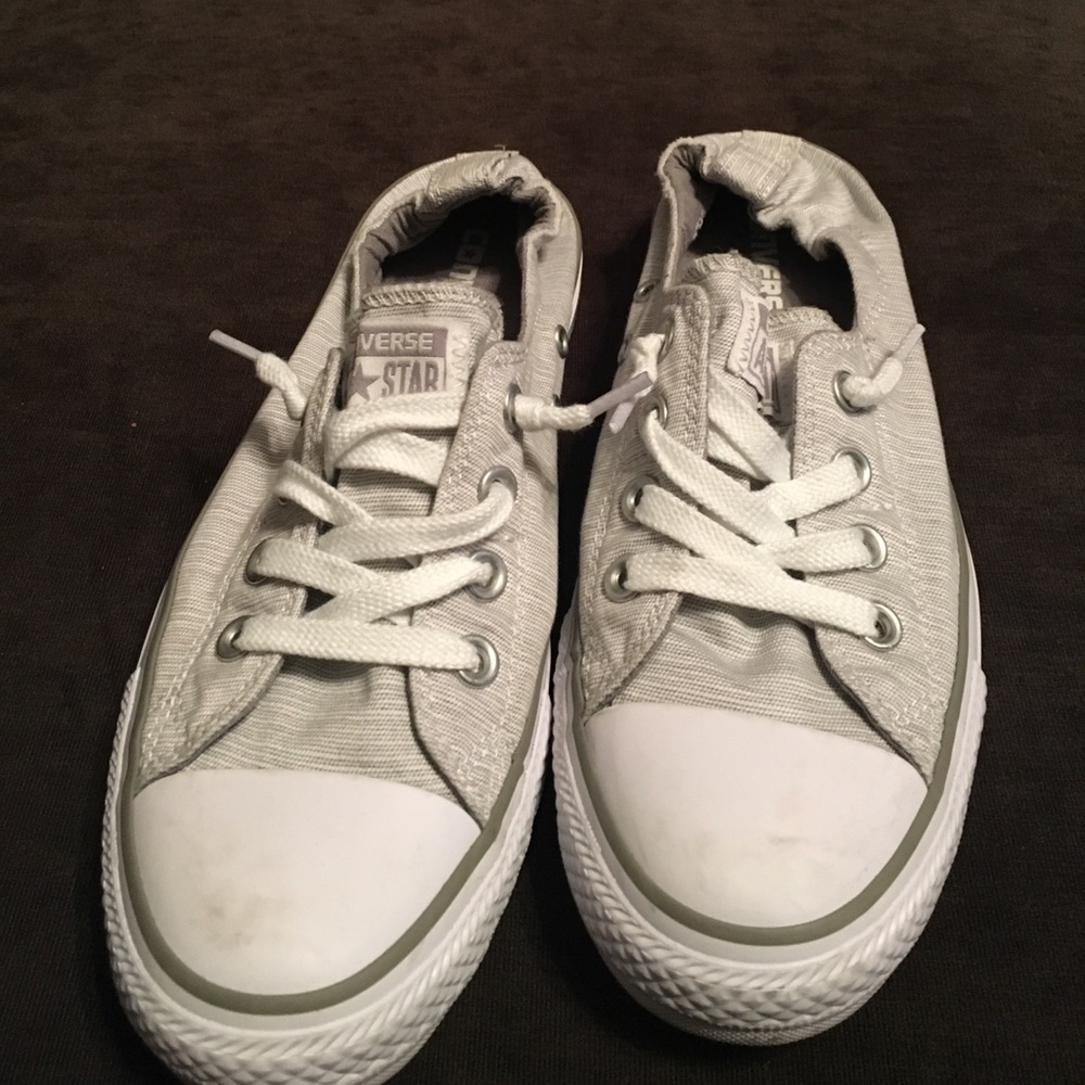 Gray and white slip on converse