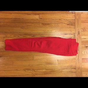 Red stretch ankle pants.