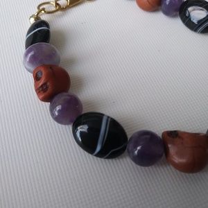 Amethyst and Black Agate with Stone Skulls -