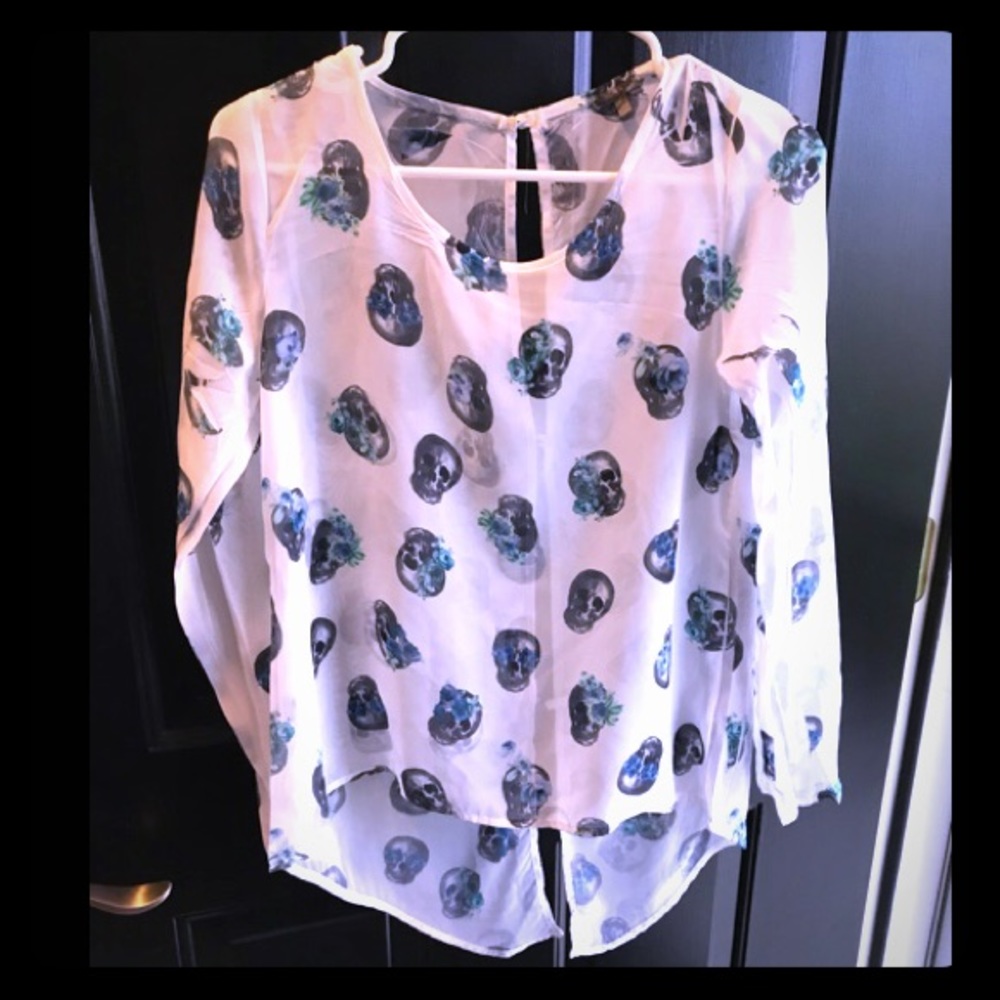 Never worn!!! Sheer open back skull shirt