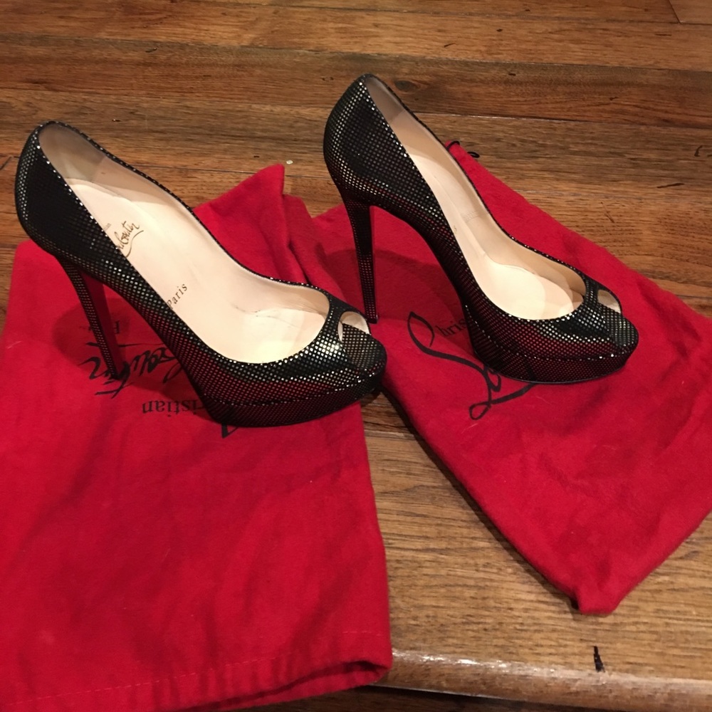 Christian Louboutin size 38.5. 140mm