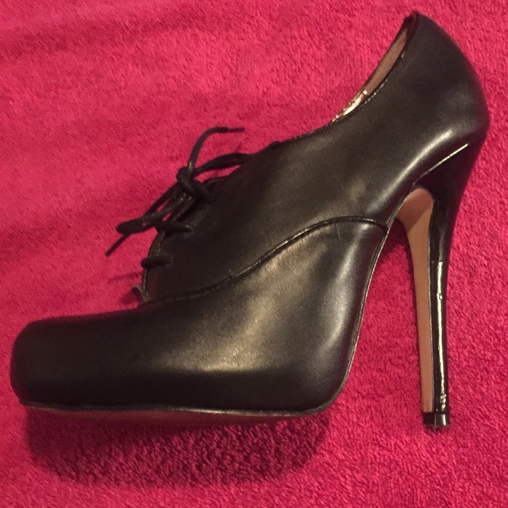 Black booties, size 6.5, worn twice, 5” heel.