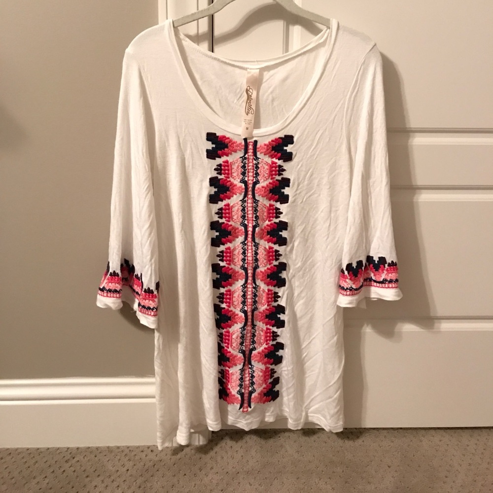 White dress with stitching pattern