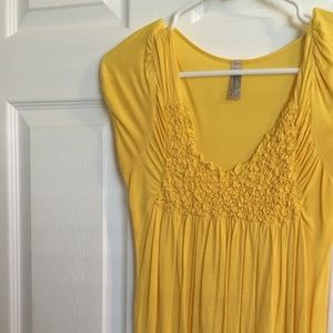 Yellow top with cute ruched detailing at bust!