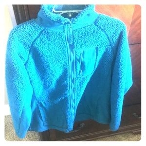Blue fuzzy jacket.