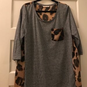 Cozy animal print top with sexy sheer back