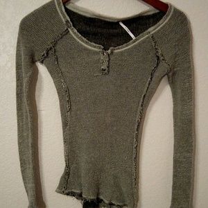 Long sleeve distressed knit top