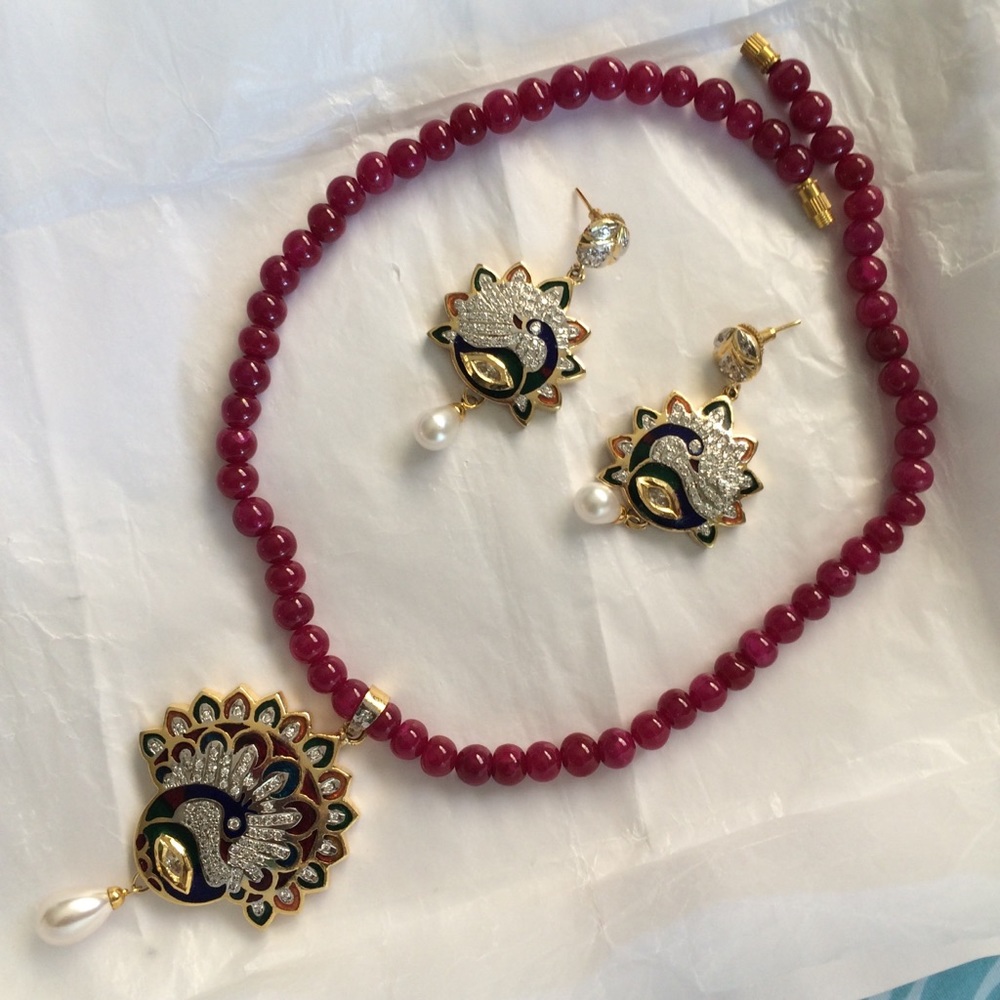 Beautiful intricate peacock necklace and earrings