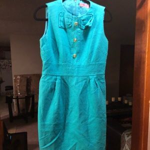 Teal cocktail dress with bow