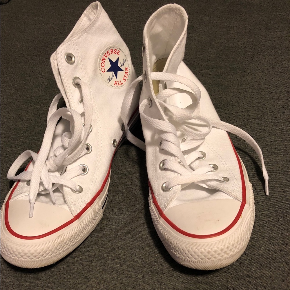 All white Chuck Taylors by Converse