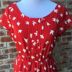 Red dress with white birds