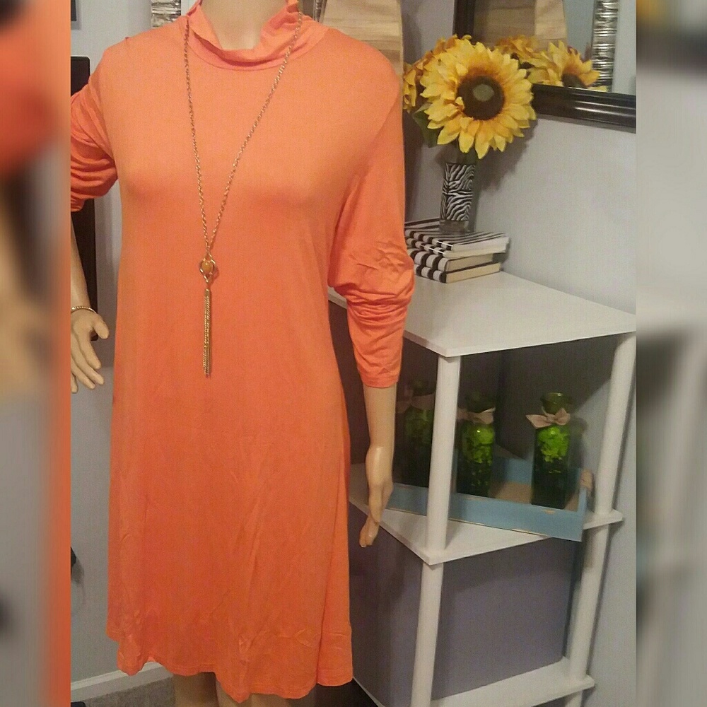 Orange turtleneck dress with pockets