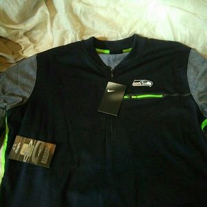 Seahawks pull over blue w/grey sleeves $20.00