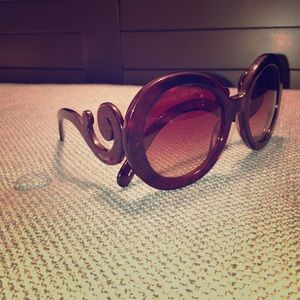 Prada “Minimal Baroque” model sunglasses