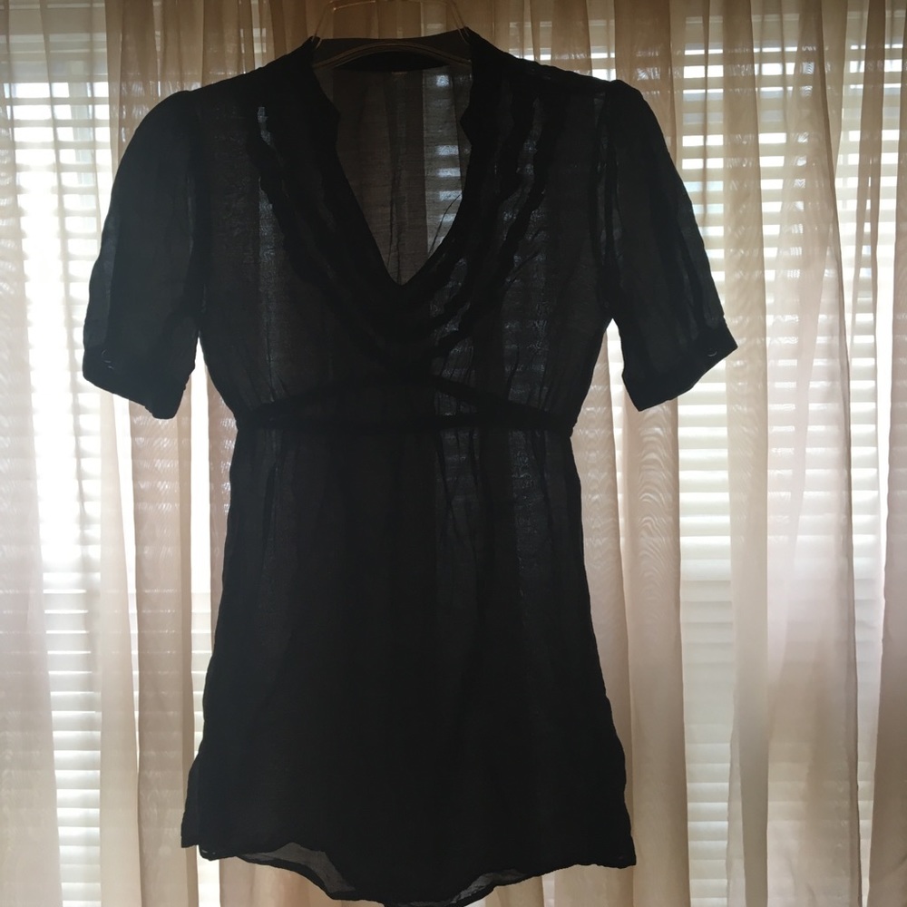 Semi sheer tunic with ruffles