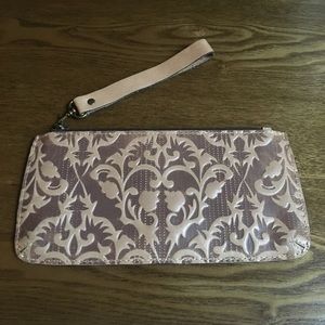 Tan embossed leather wristlet