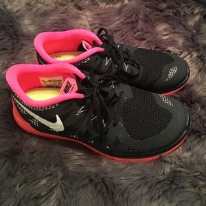 Black and neon Nike Free 5.0