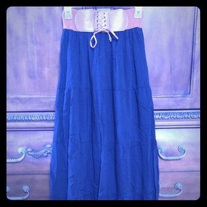 Long float black skirt.