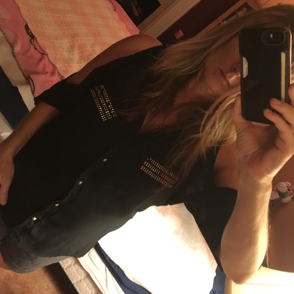 Black top, sheer with metal details &  arm cut out