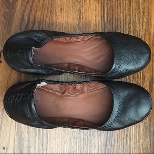 Black leather ballet flats