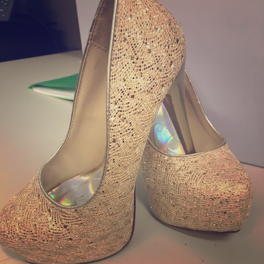 Gold stilettos 2 inch platform w 6 inch heel.
