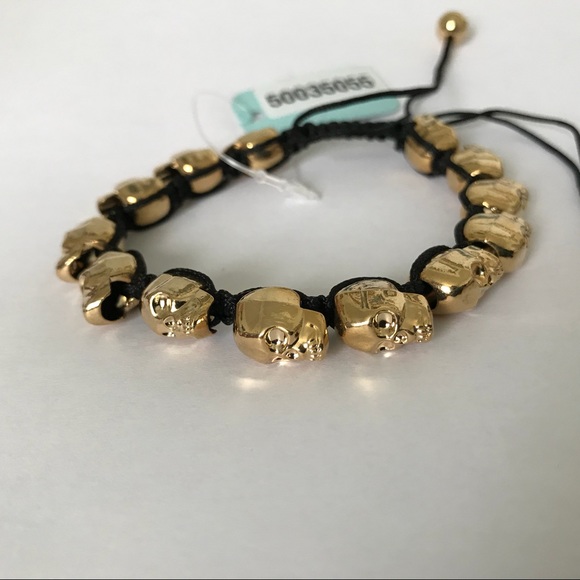 Golden skull bracelet with adjustable black cord - Picture 4 of 8