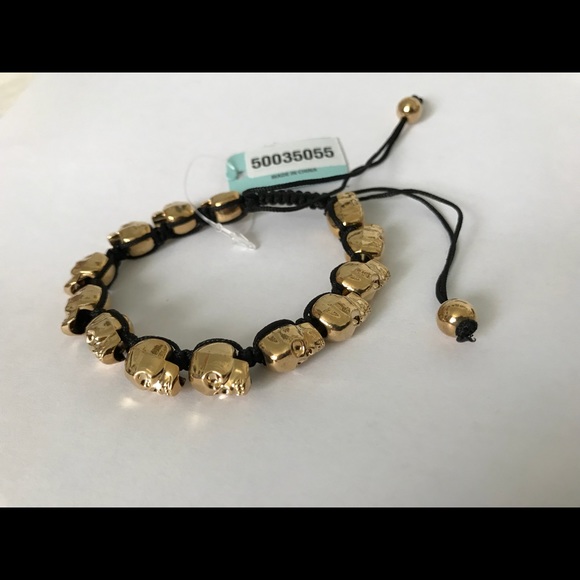 Golden skull bracelet with adjustable black cord - Picture 5 of 8