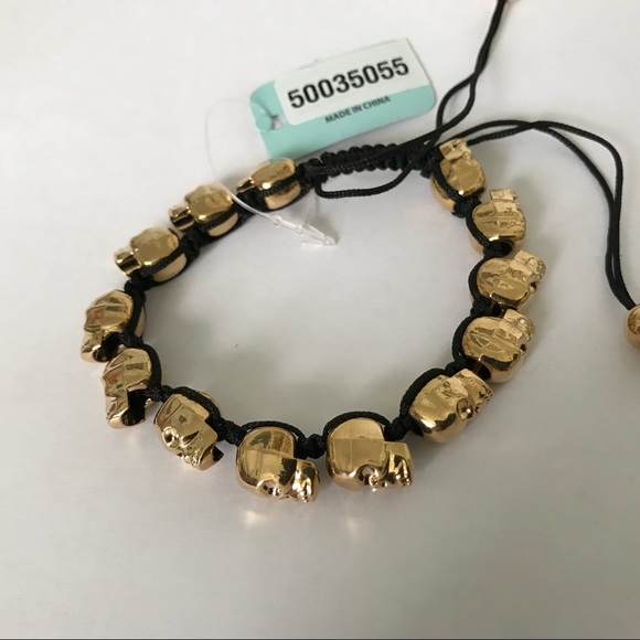 Golden skull bracelet with adjustable black cord - Picture 6 of 8