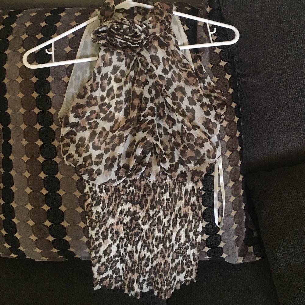 Cute sexy cheetah print blouse worn once .