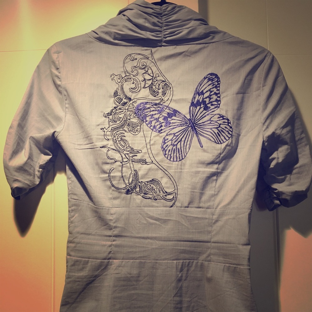 Cute St. Martins Blouse with butterfly embroidery.