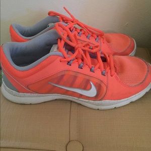 Beautiful neon orange nike shoes