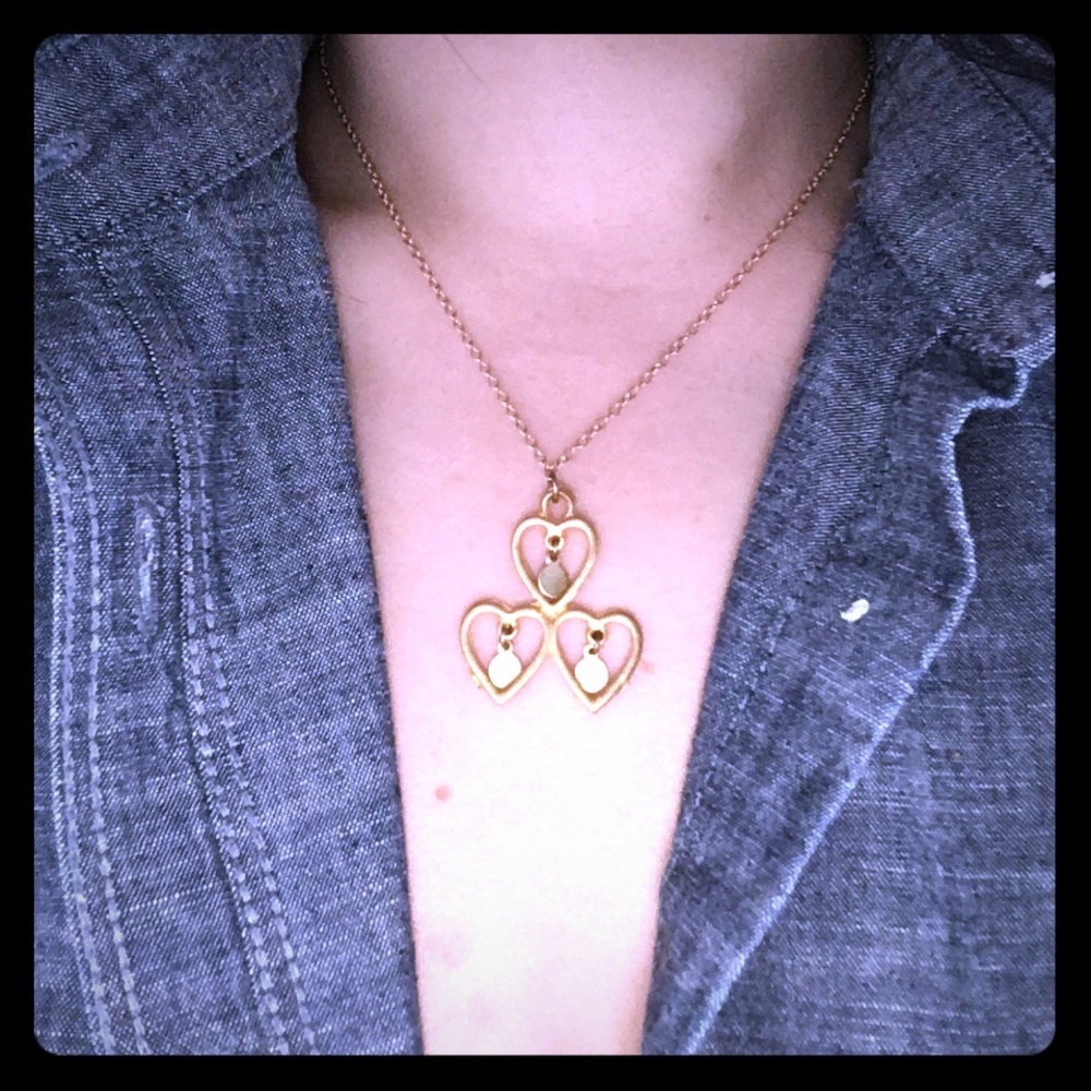 Triple heart gold pendant necklace