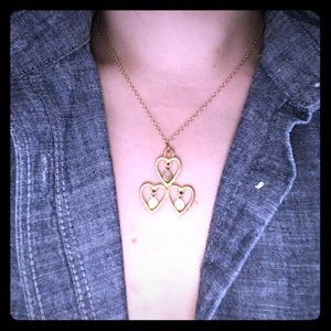Triple heart gold pendant necklace