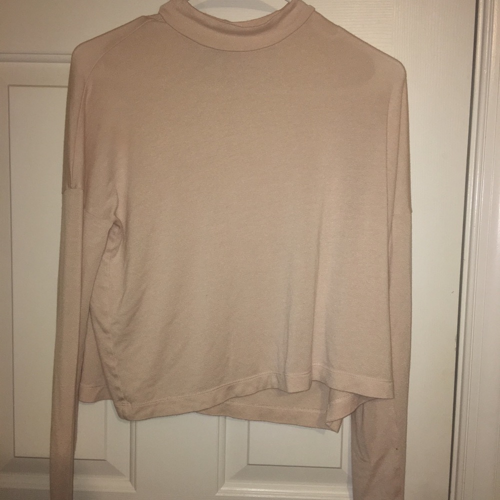 Cream colored high necked crop top