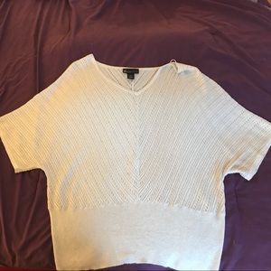 Shimmering white blousy sweater