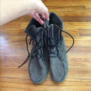 Grey Minnetonka fringe ankle booties