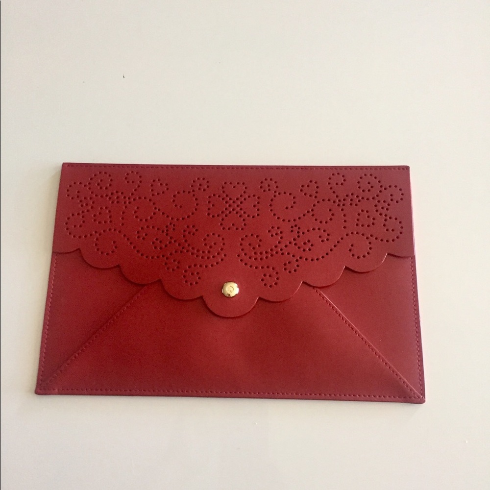 NWOT kate spade red leather laser cut clutch